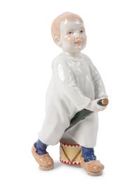 A Meissen Porcelain Figure of a Boy with Drum, by Konrad Hentschel
