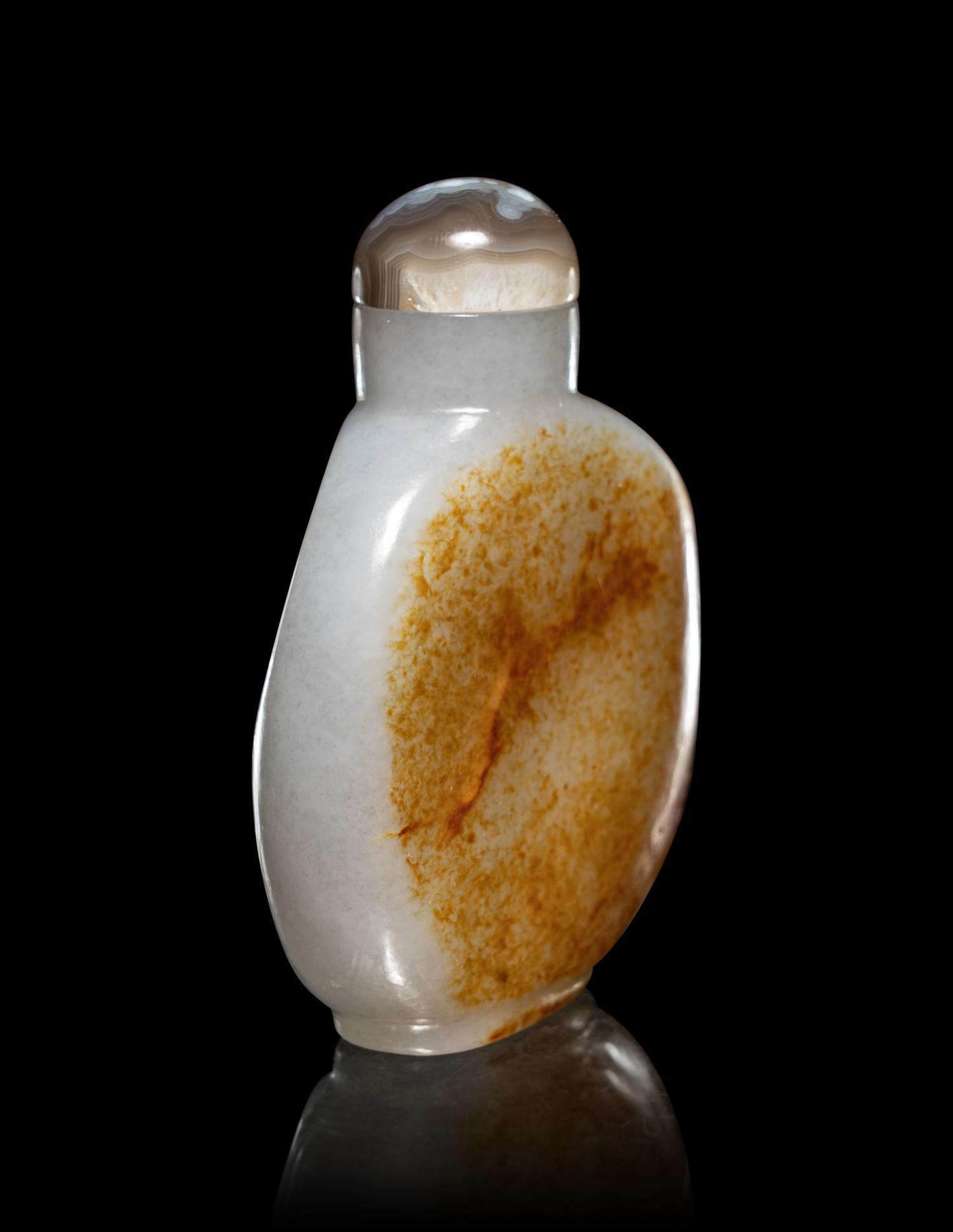 A Russet and Greyish Celadon Jade Snuff Bottle