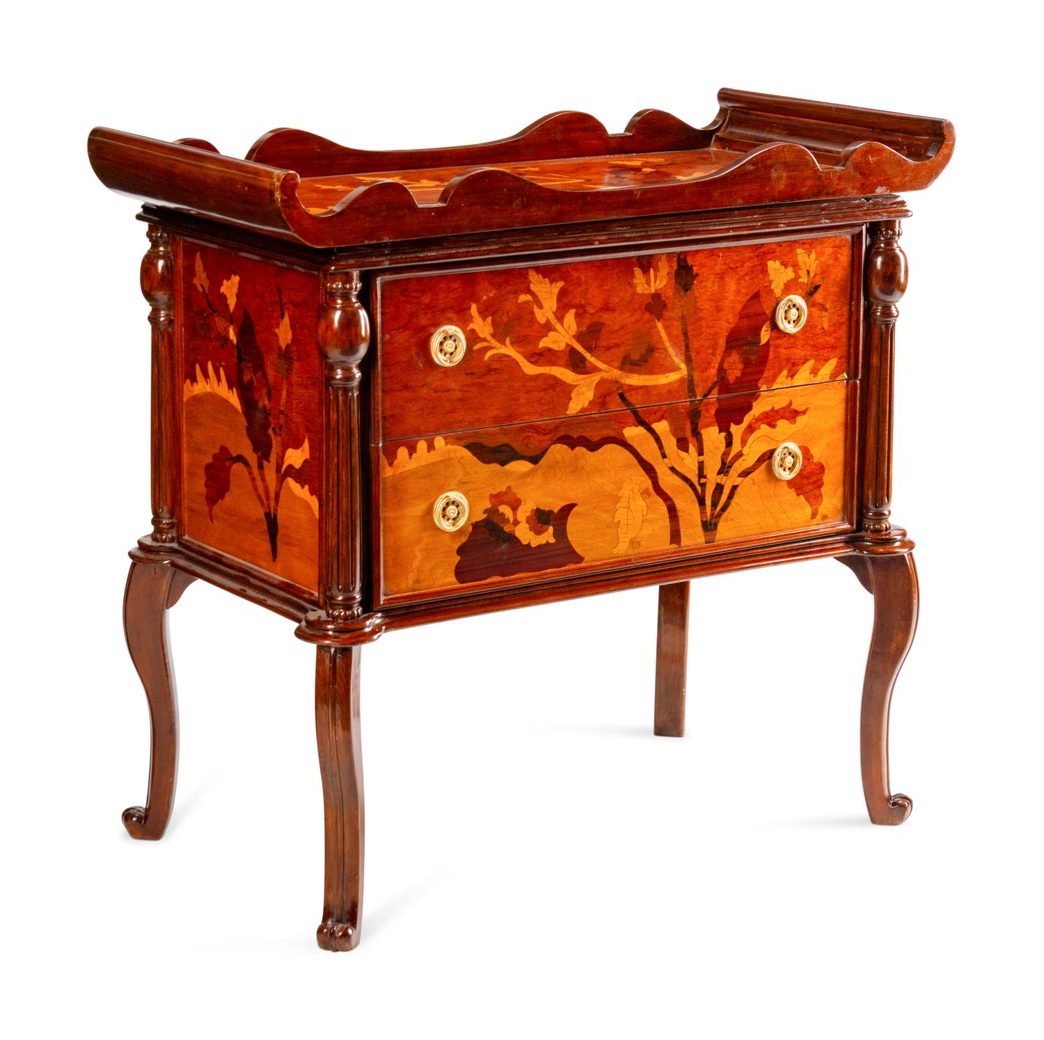 An Art Nouveau Style Inlaid Chest of Drawers