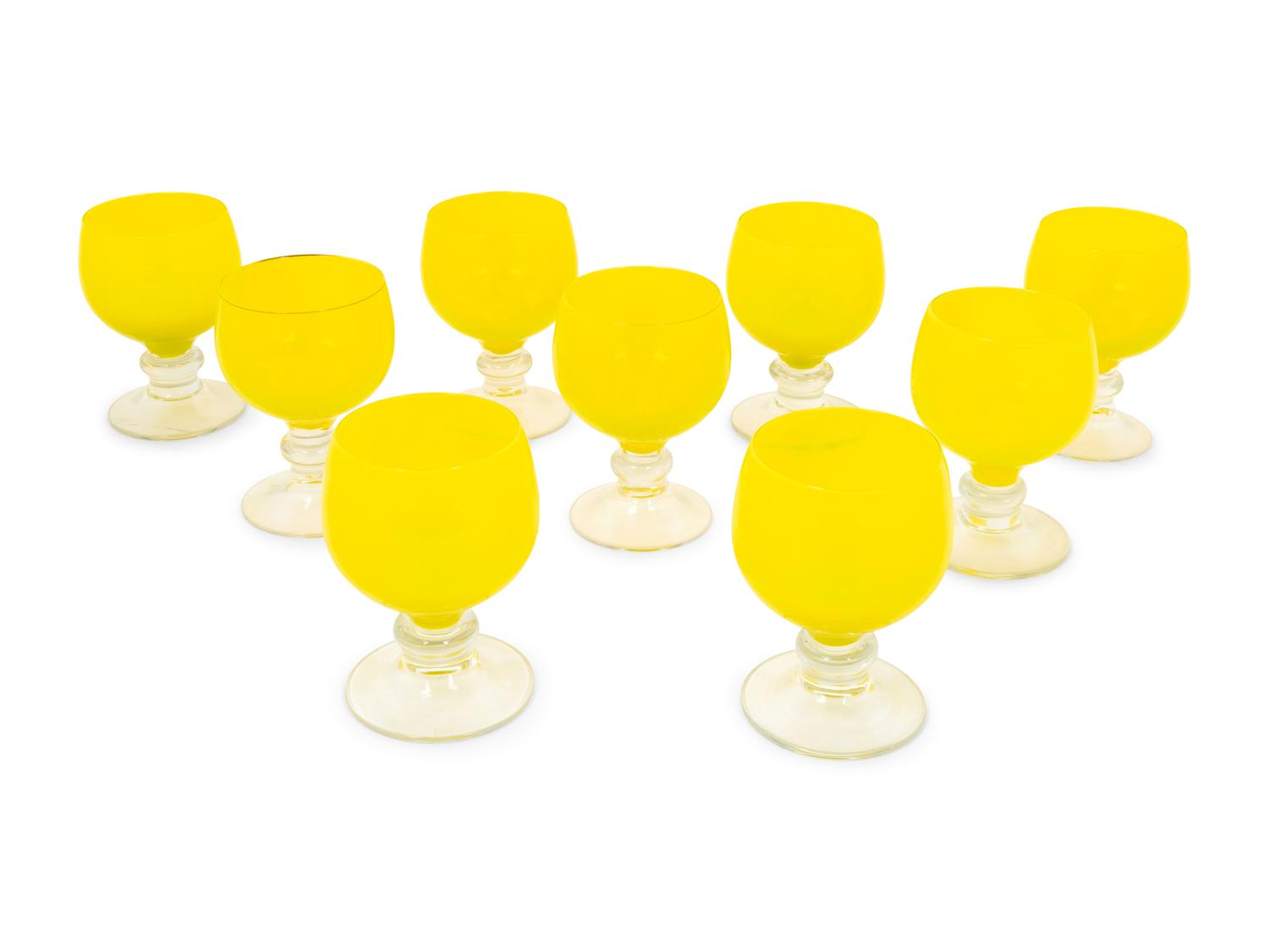 A Set of Nine Yellow Glass Goblets