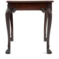 An Irish George III Shell, Acanthus and Bell-Flower Carved and Figured Mahogany Hairy Paw Foot Side Table