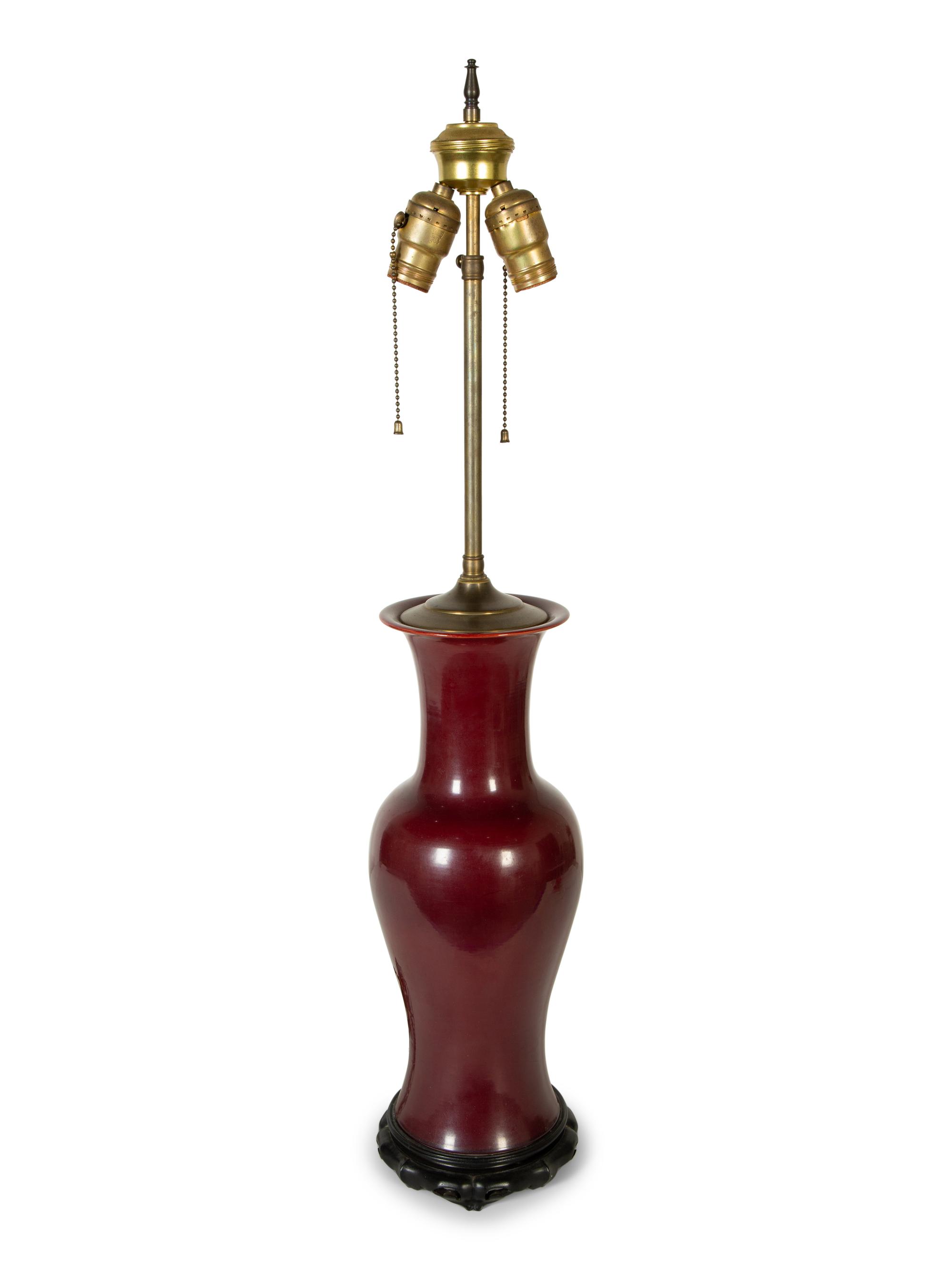 An Iron Red Glazed Porcelain Vase Mounted as a Lamp