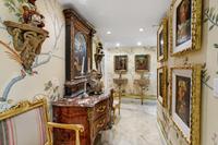 A North Italian Neoclassical Blue Painted and Parcel Gilt Mirror