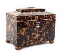 An English Tortoise Shell Tea Caddy, Height 4 1/4 x width 5 x depth 3 inches.