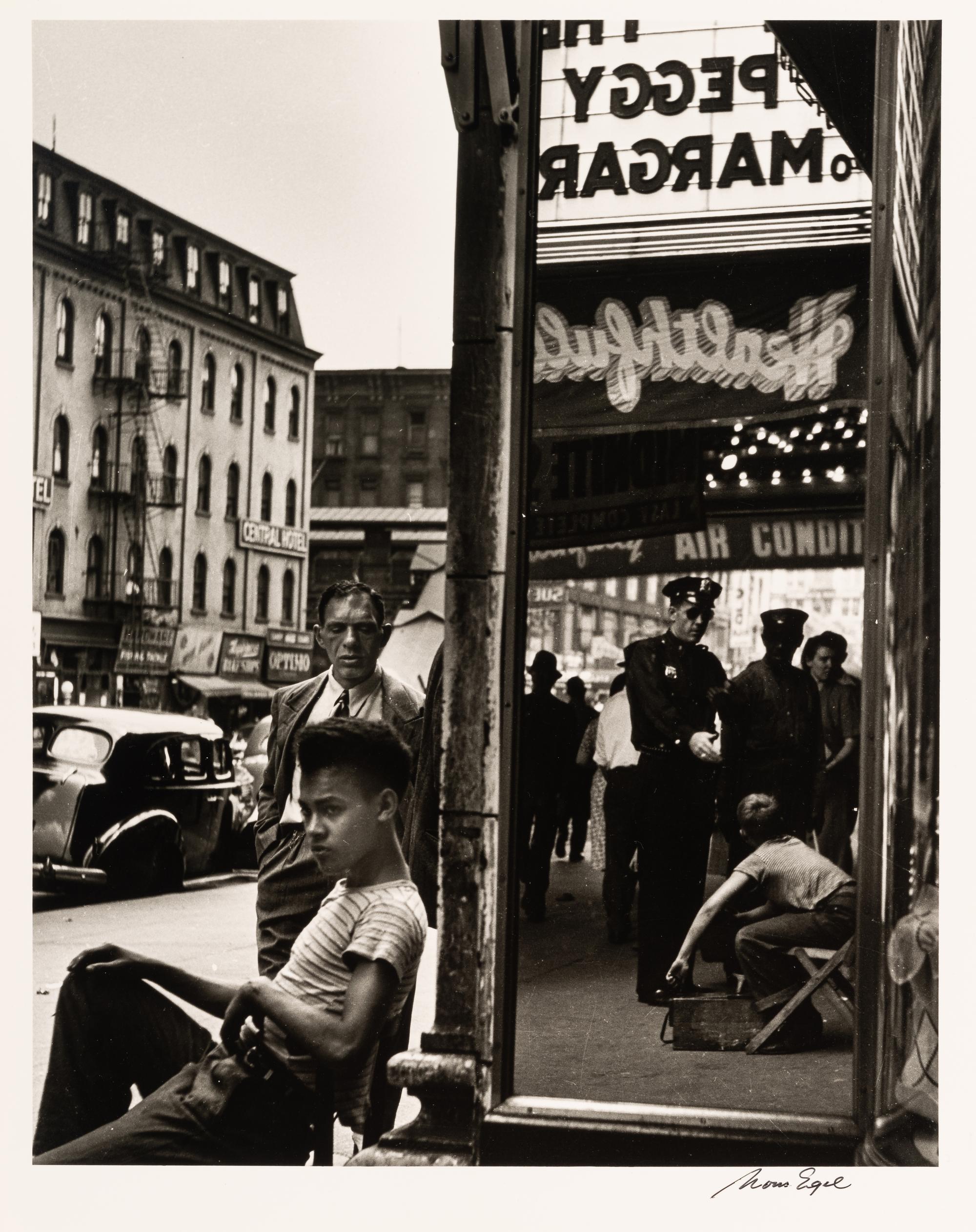 Morris Engel (1918-2005) Shoeshine Boy with Cop, 14th Street, New York City, 1947