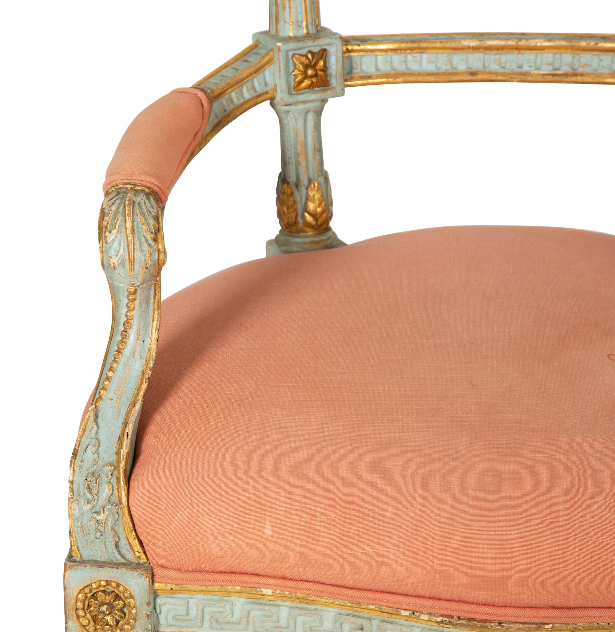 A Pair of Venetian Painted and Parcel Gilt Armchairs