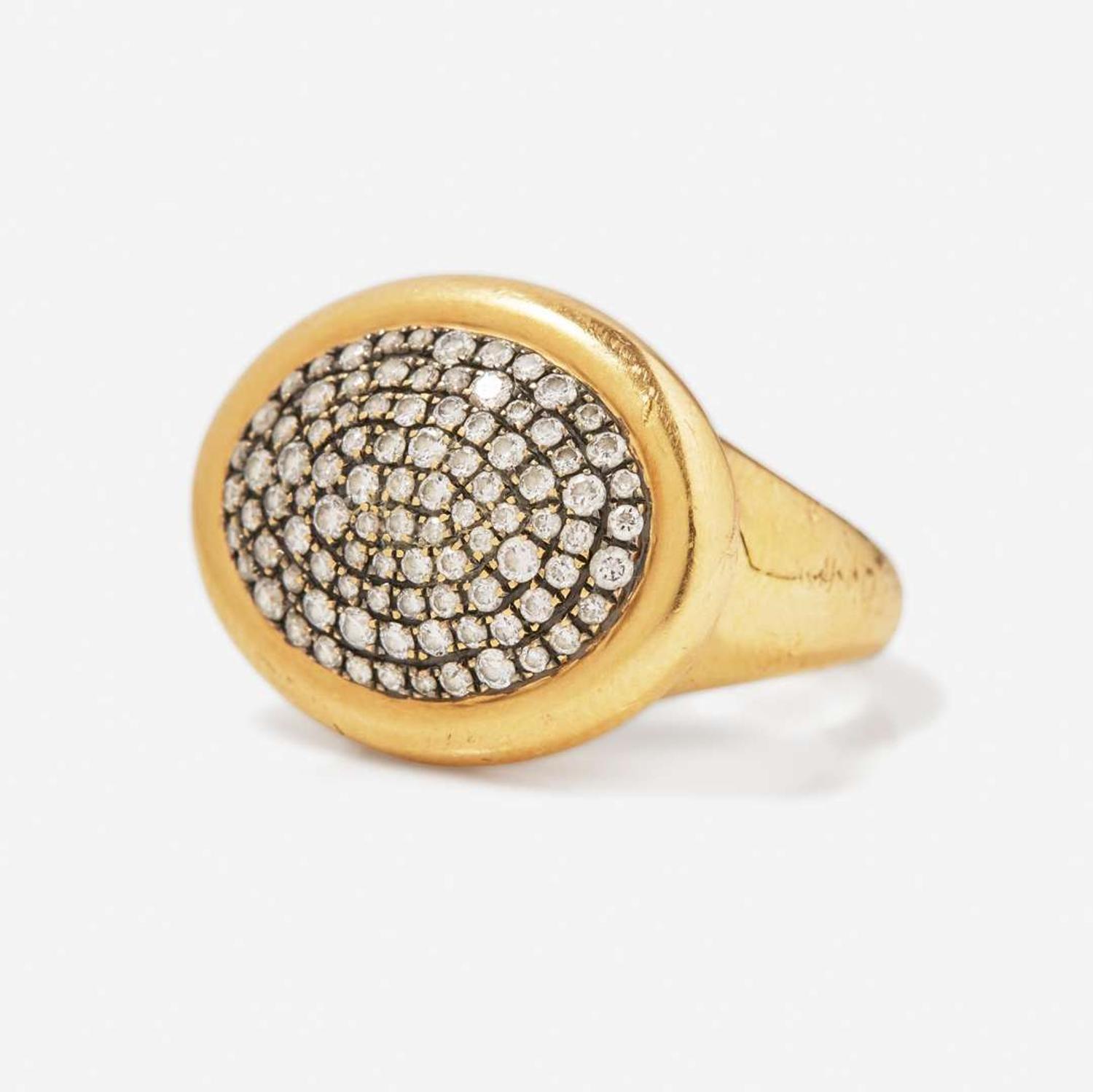 An 18K Yellow Gold Ring and Necklace