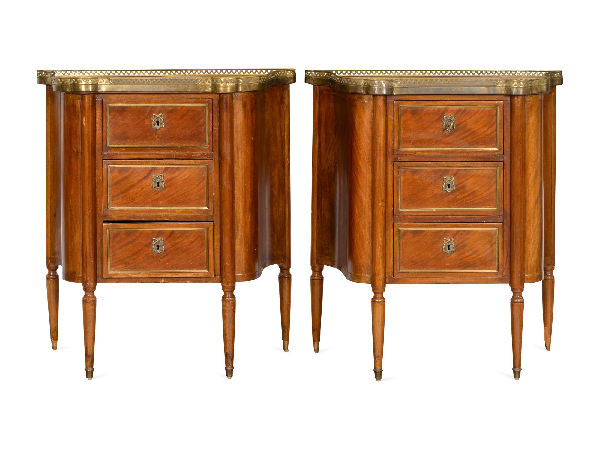 A Pair of Louis XVI Style Brass-Mounted Mahogany Side Cabinets with Marble Tops