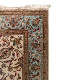 A Tabriz Wool Rug
