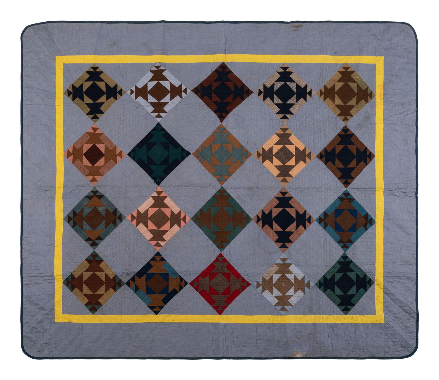 A Pieced Cotton 'Basket and Square' Pattern Quilt