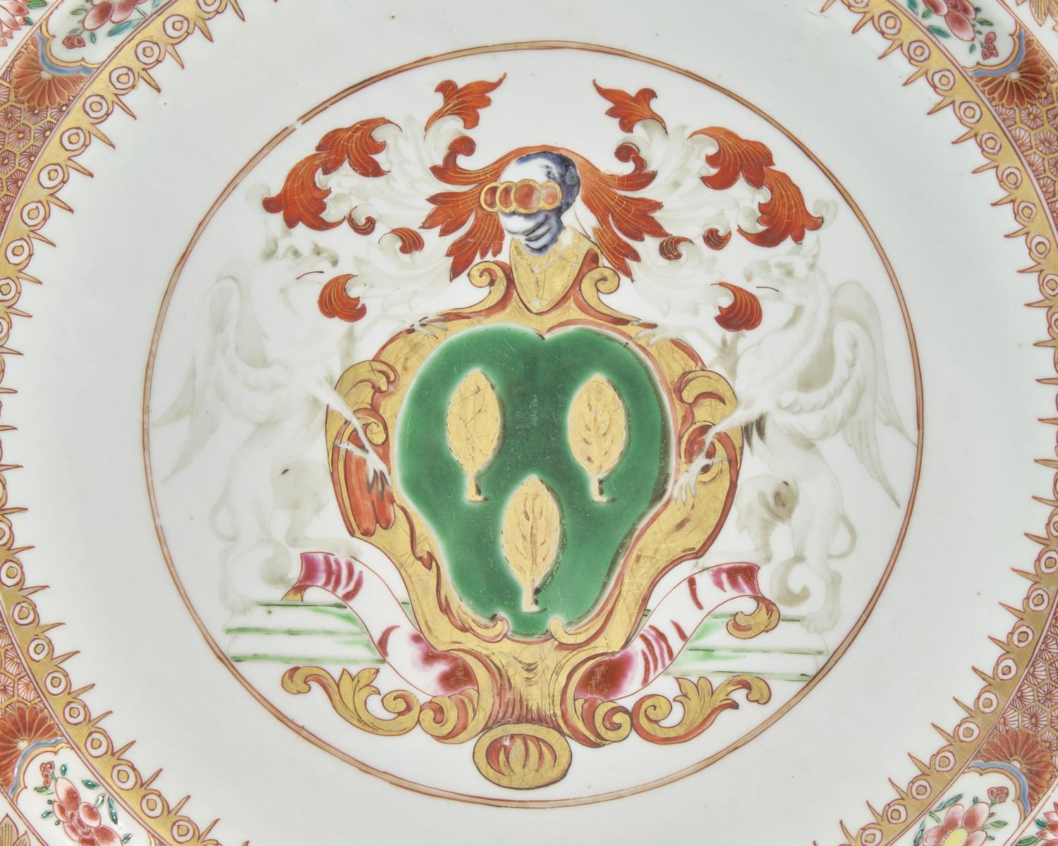 A Pair Of Large Chinese Export Porcelain Chargers Bearing The Arms Of Woodward