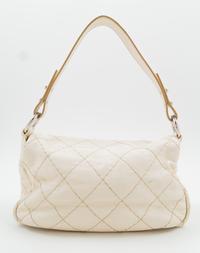 A Chanel Cream Leather Wild Stitch Shoulder Bag, 12" x 8" x 3.5"; Handle drop: 8.5".