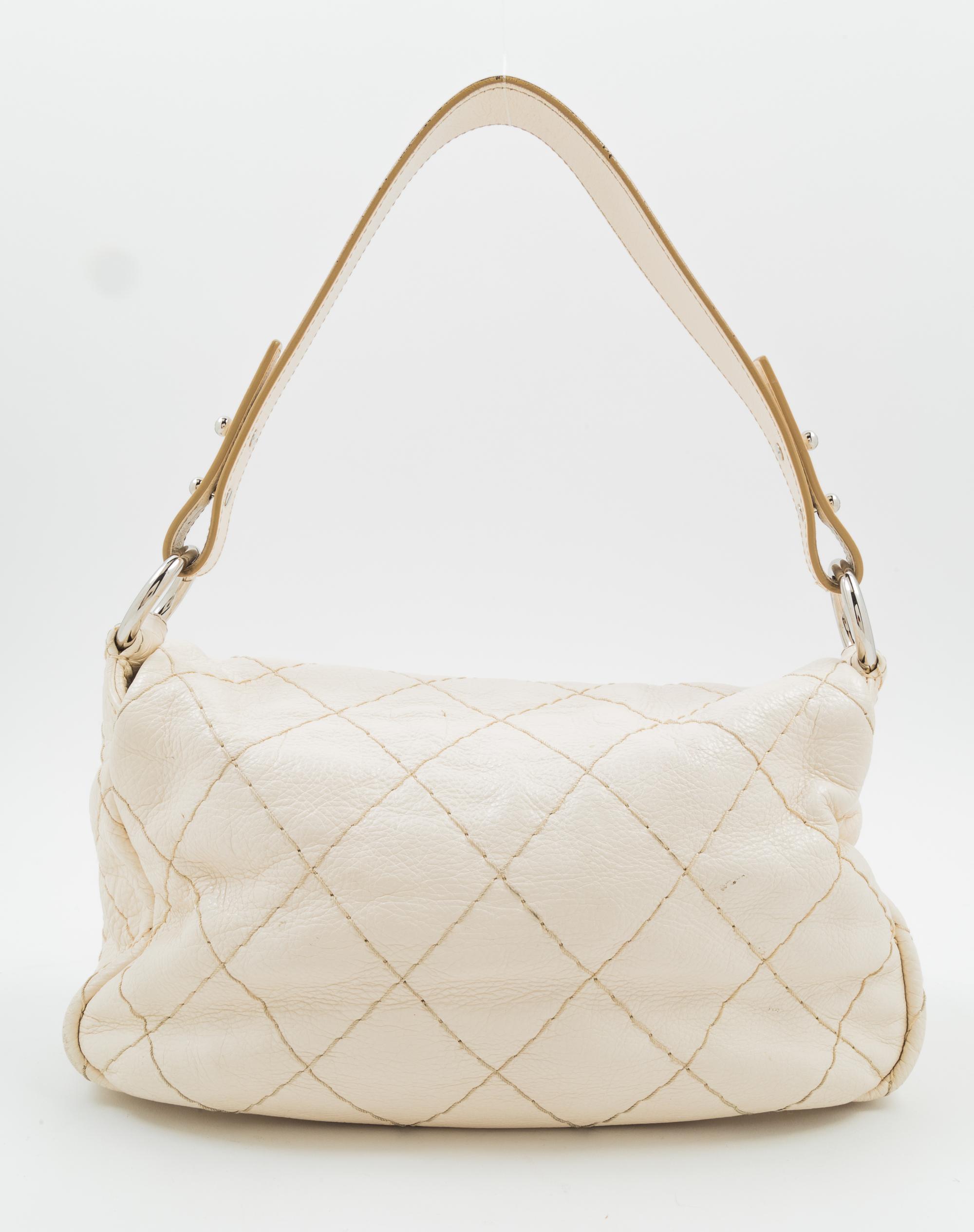 A Chanel Cream Leather Wild Stitch Shoulder Bag, 12" x 8" x 3.5"; Handle drop: 8.5".