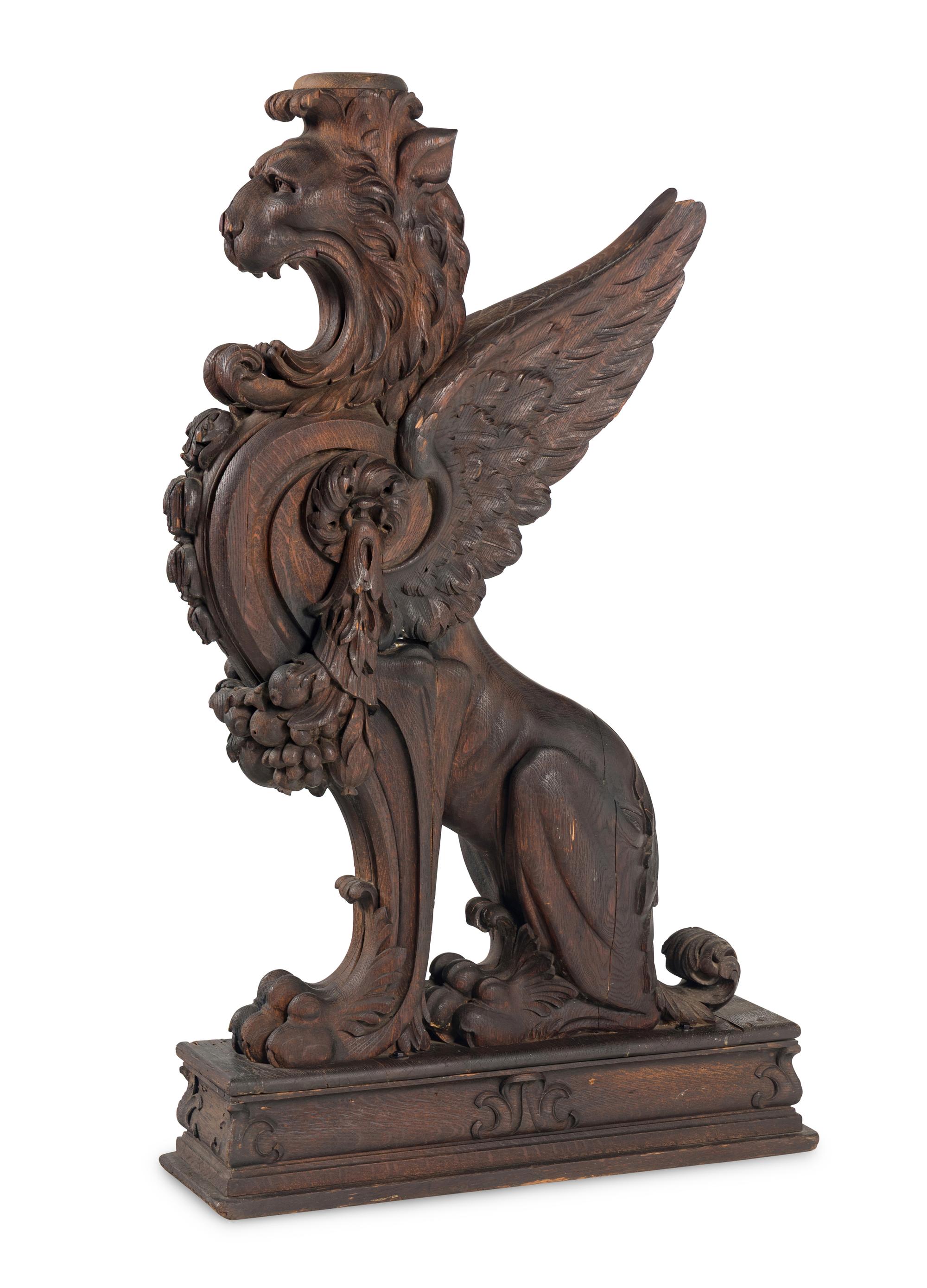 A Massive Carved Oak Griffin Newel Post