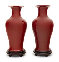 A Pair of Chinese Red Glazed Vases on Stands