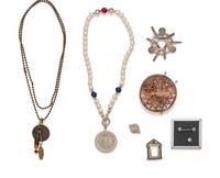 COLLECTION OF SEVEN PATRIOTIC AND FEMINISM THEMED JEWELRY ITEMS