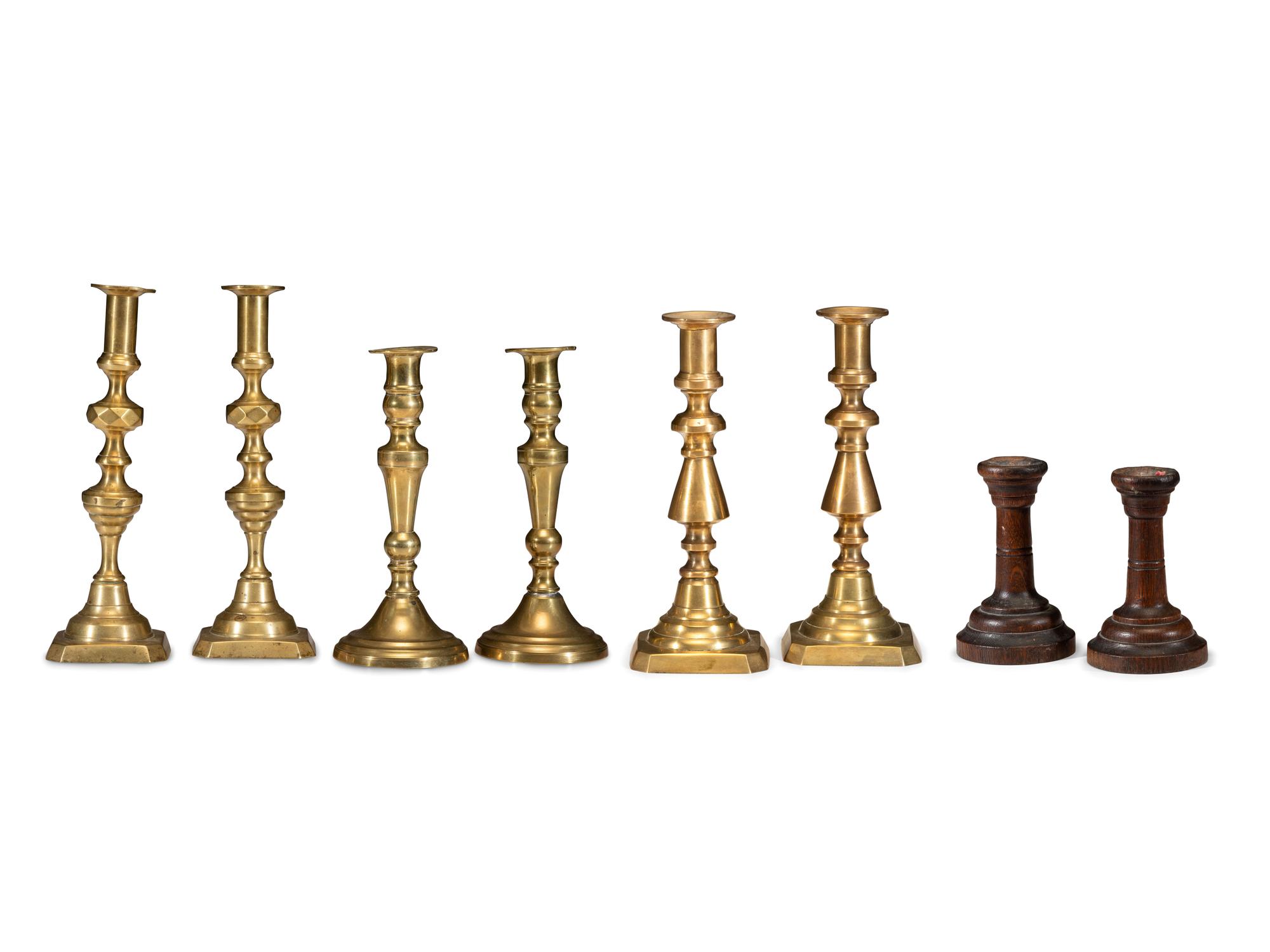Three Pairs of English Brass Candlesticks
