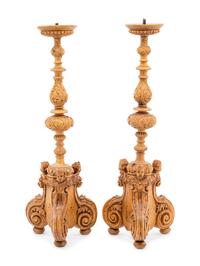 A Pair of Continental Carved Wood Prickets
