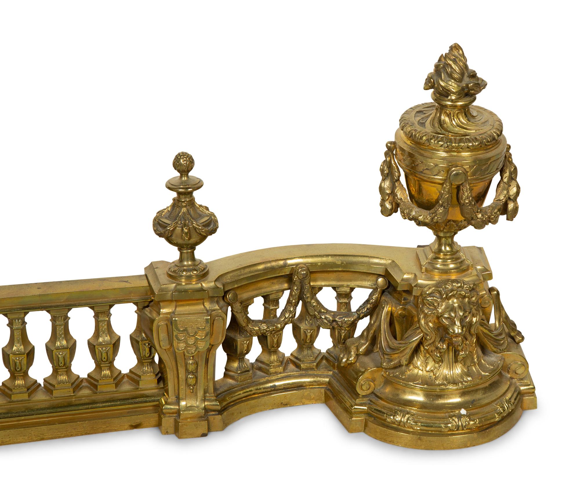 A Neoclassical Brass Fire Fender with a Set of Tools