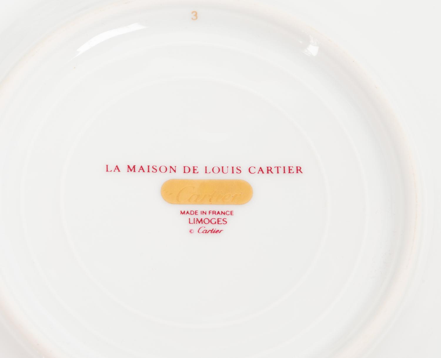 A Cartier La Maison de Louis Porcelain Dinner Service for Twelve