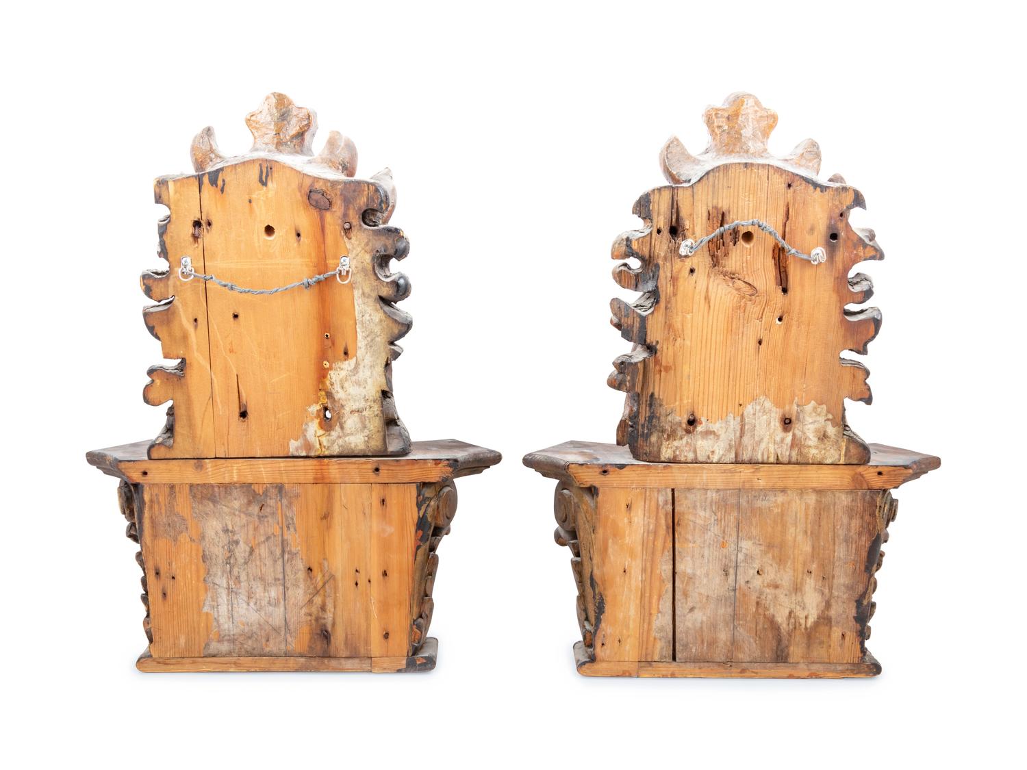 A Pair of Italian Painted and Parcel Gilt Masks