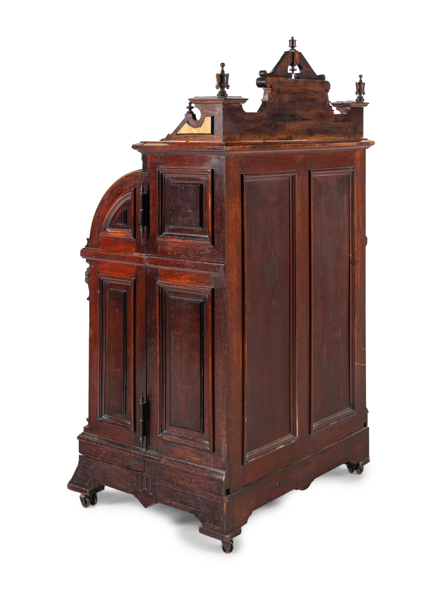 A Victorian Walnut and Bird’s Eye Maple Wooten Patent Desk