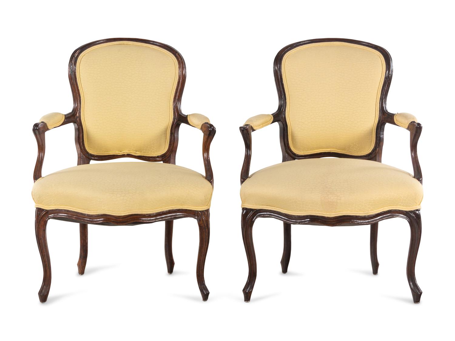 A Pair of Louis XV Beechwood or Walnut Fauteuils
