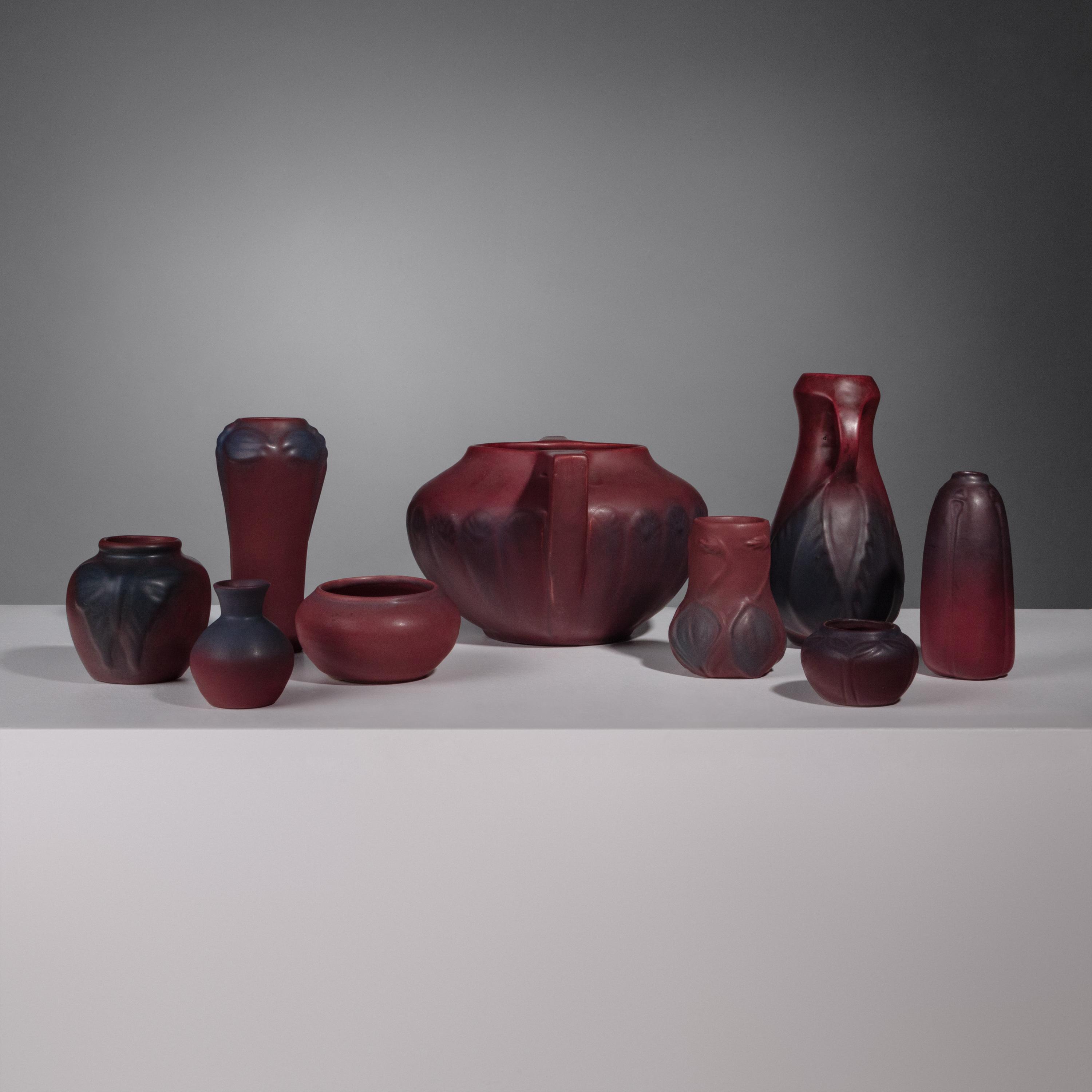 Group of Nine Mulberry Red Pottery Vases