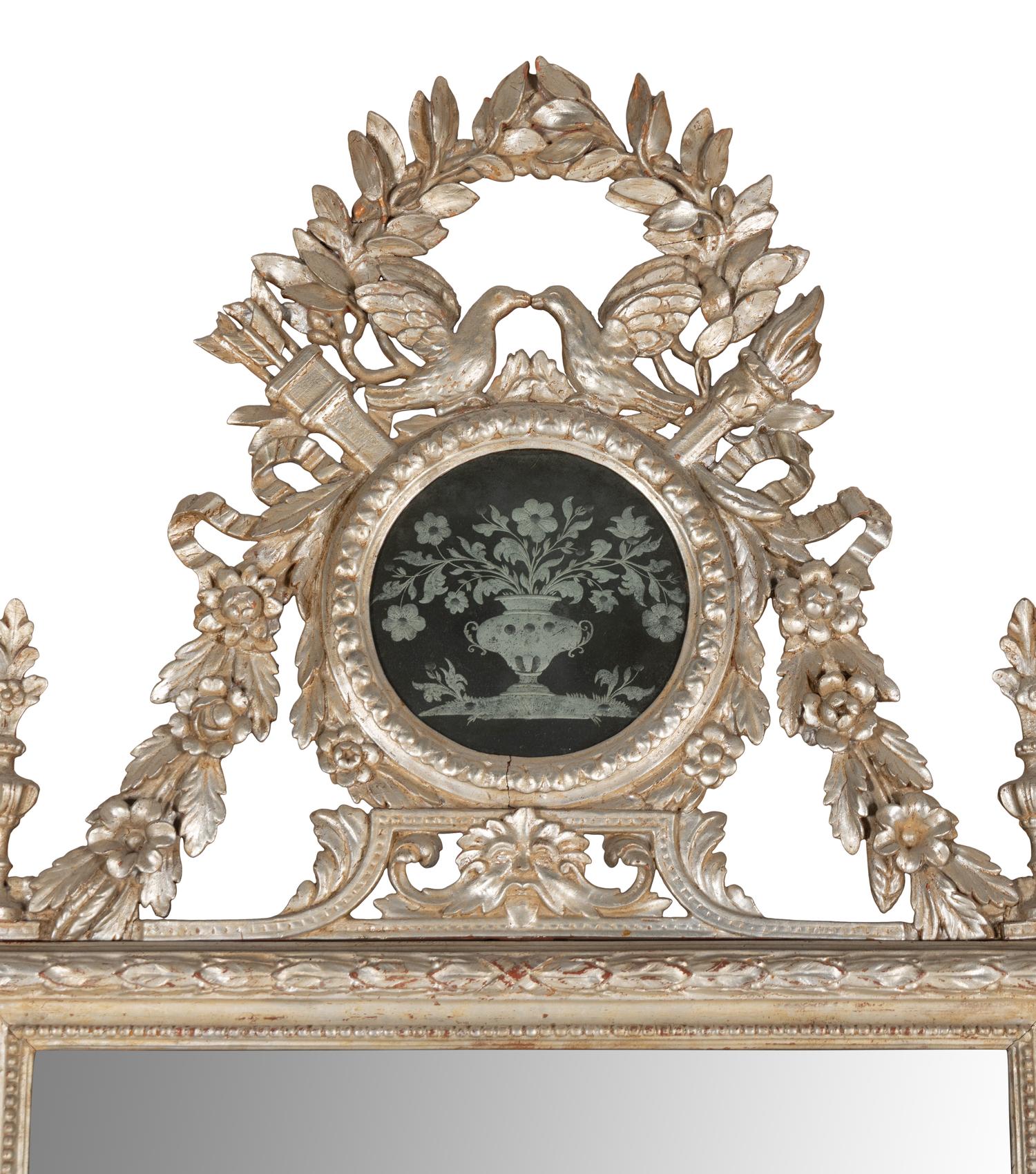 An Italian Silvered Wood and Etched Glass Mirror