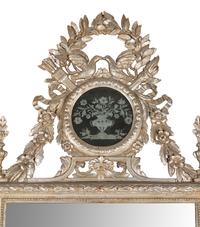 An Italian Silvered Wood and Etched Glass Mirror
