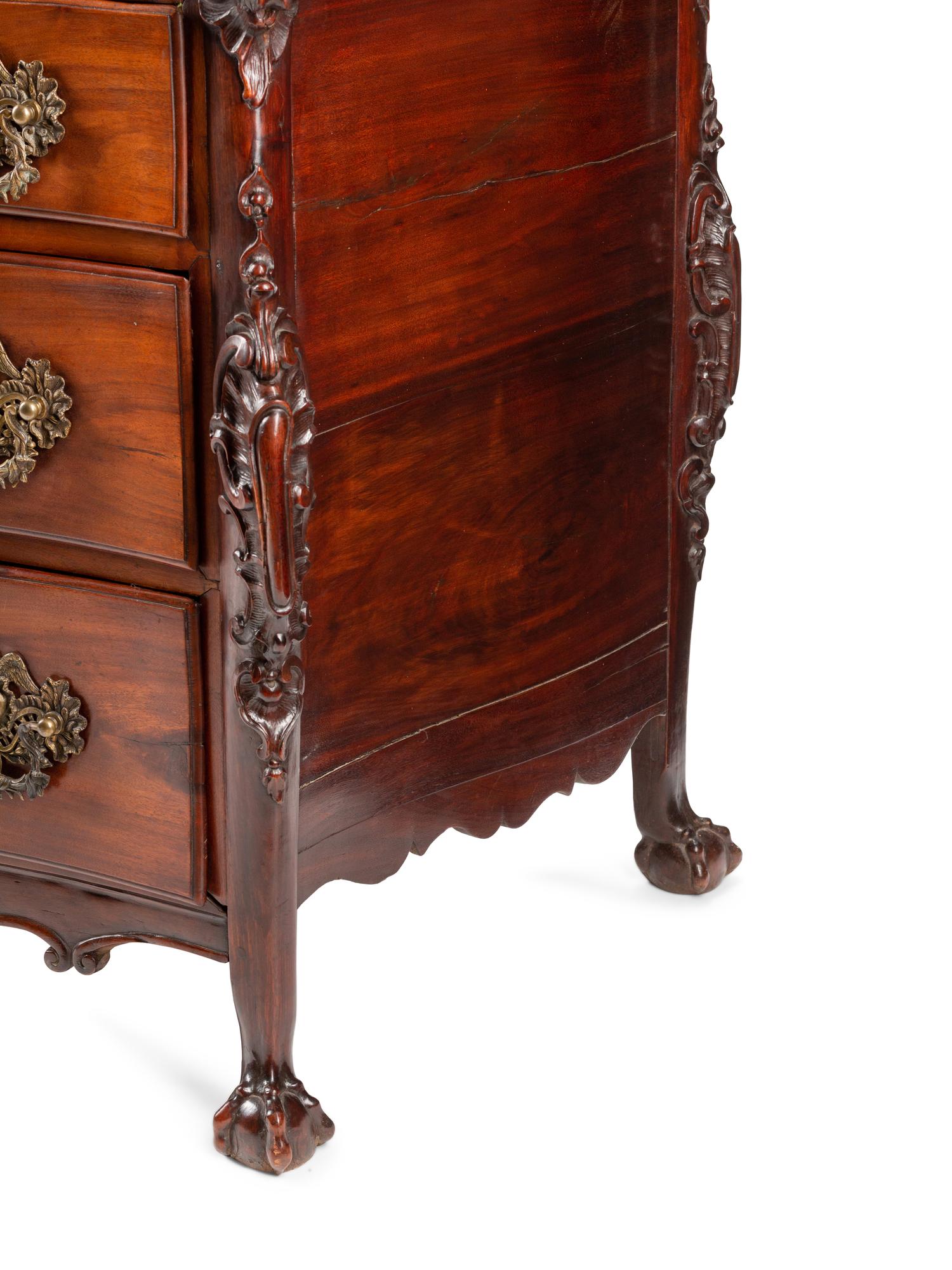 A Portuguese Carved Walnut Commode