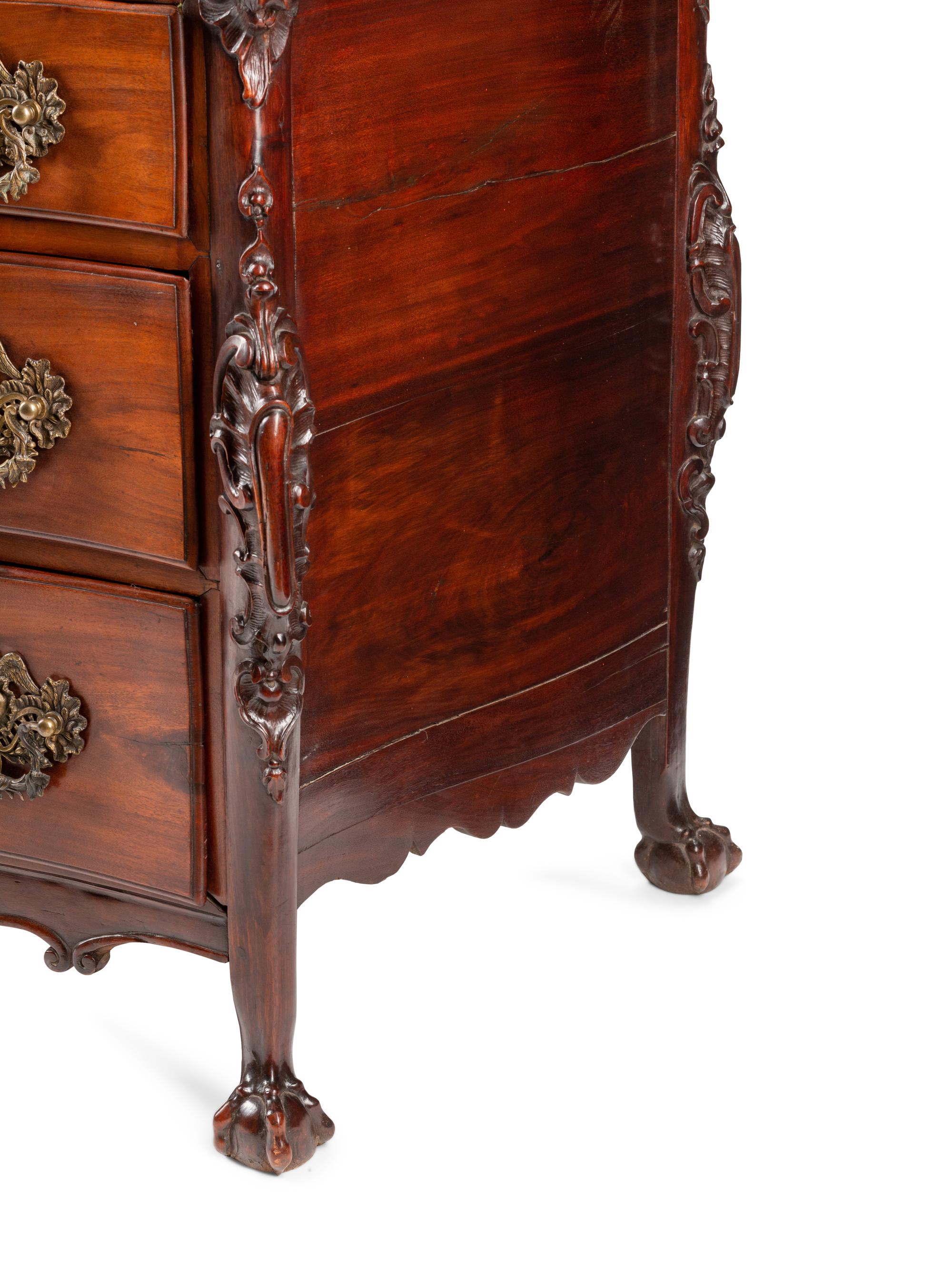 A Portuguese Carved Walnut Commode