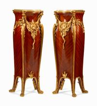 A Pair of Louis XV Style Gilt Bronze Mounted Mahogany Pedestals