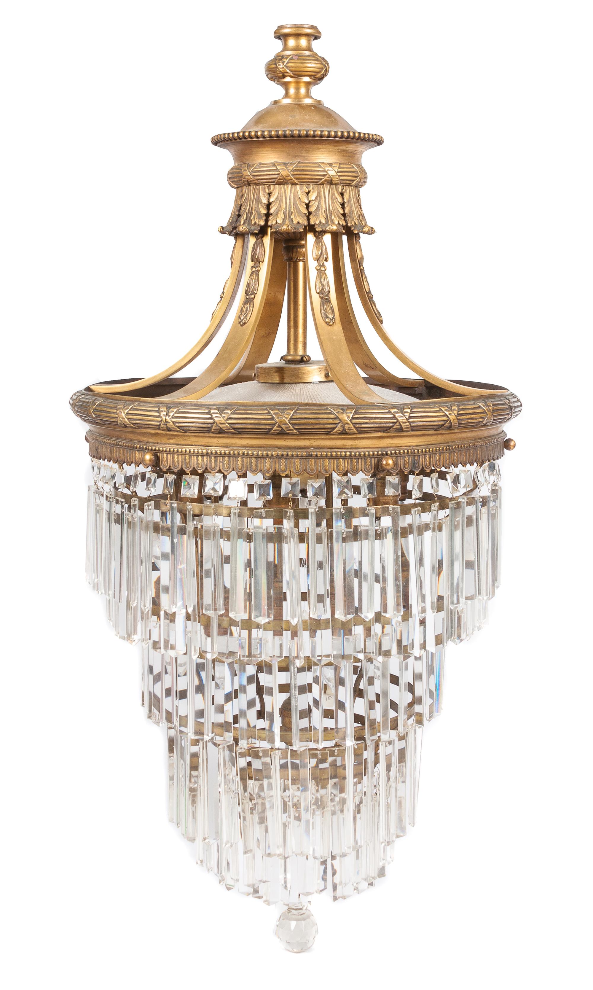 A Neoclassical Giltmetal Chandelier Height 50 inches.