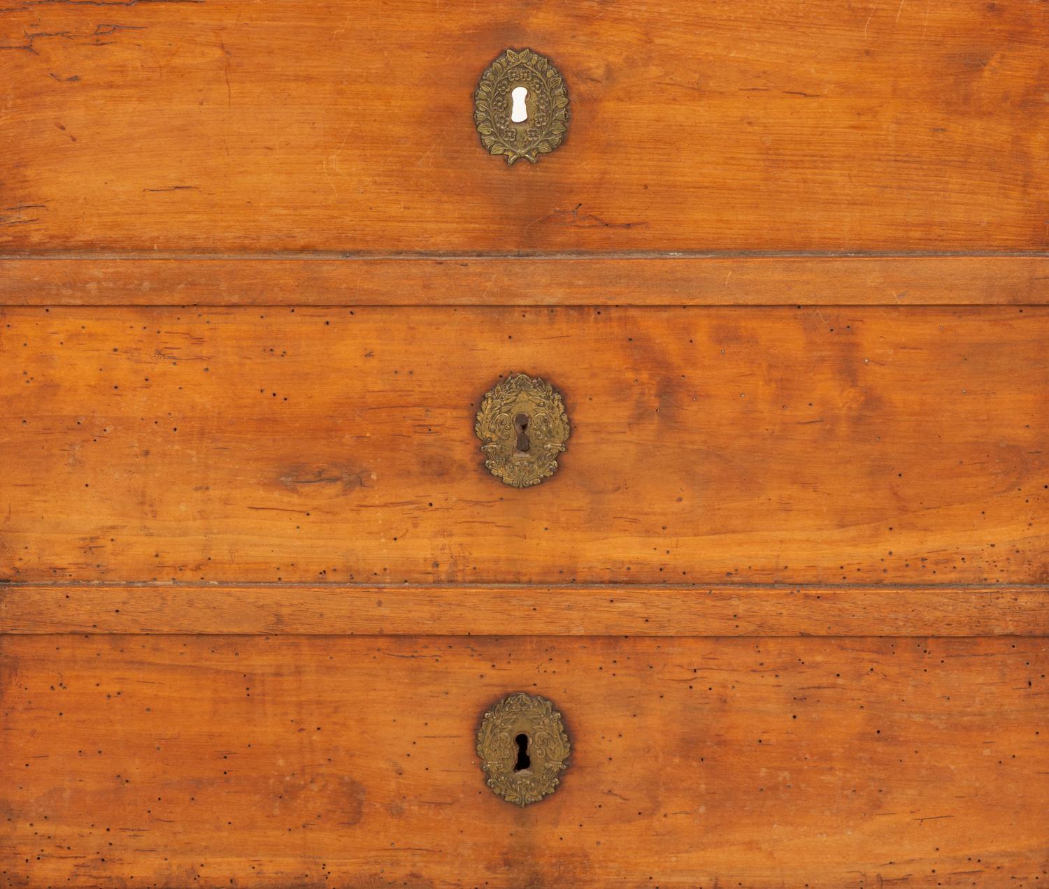 An Empire Walnut Cabinet