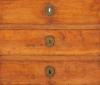 An Empire Walnut Cabinet