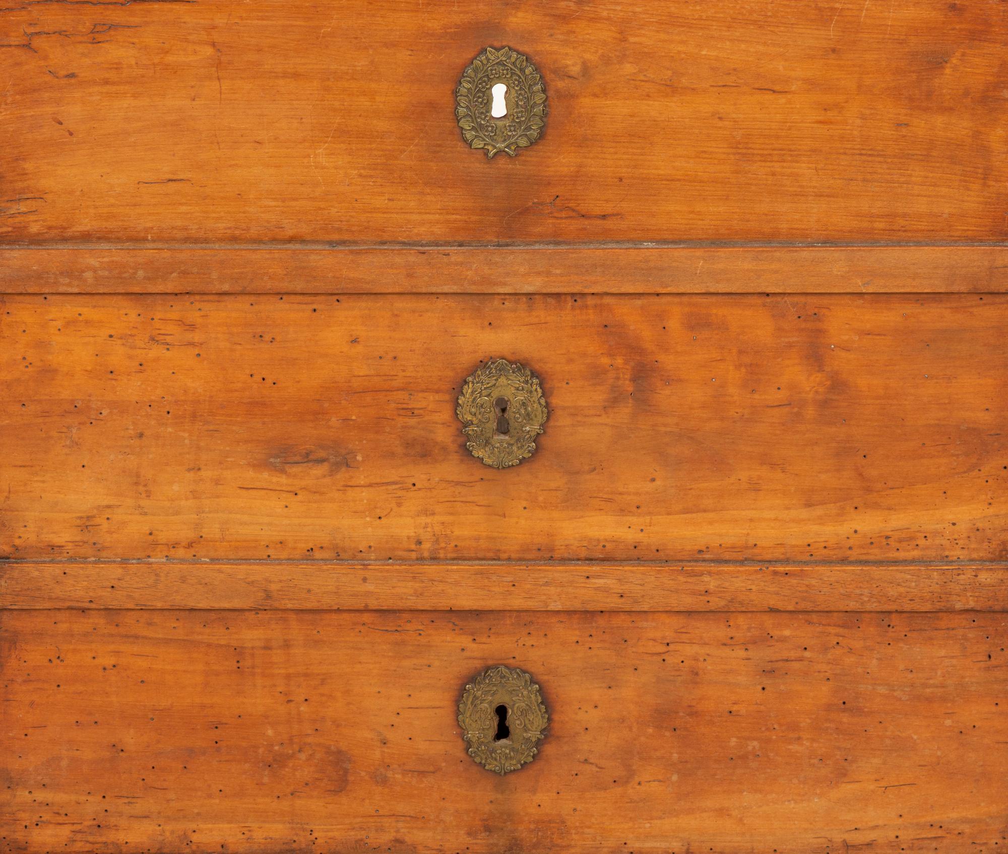 An Empire Walnut Cabinet