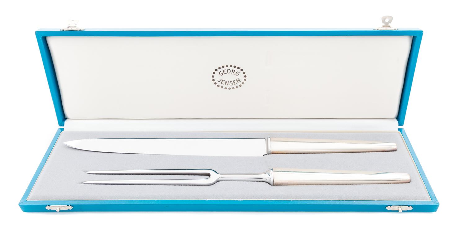 A Danish Silver Carving Set, Georg Jensen Silversmithy, Copenhagen, Second Half 20th Century, comprising a knife and a fork in a fitted