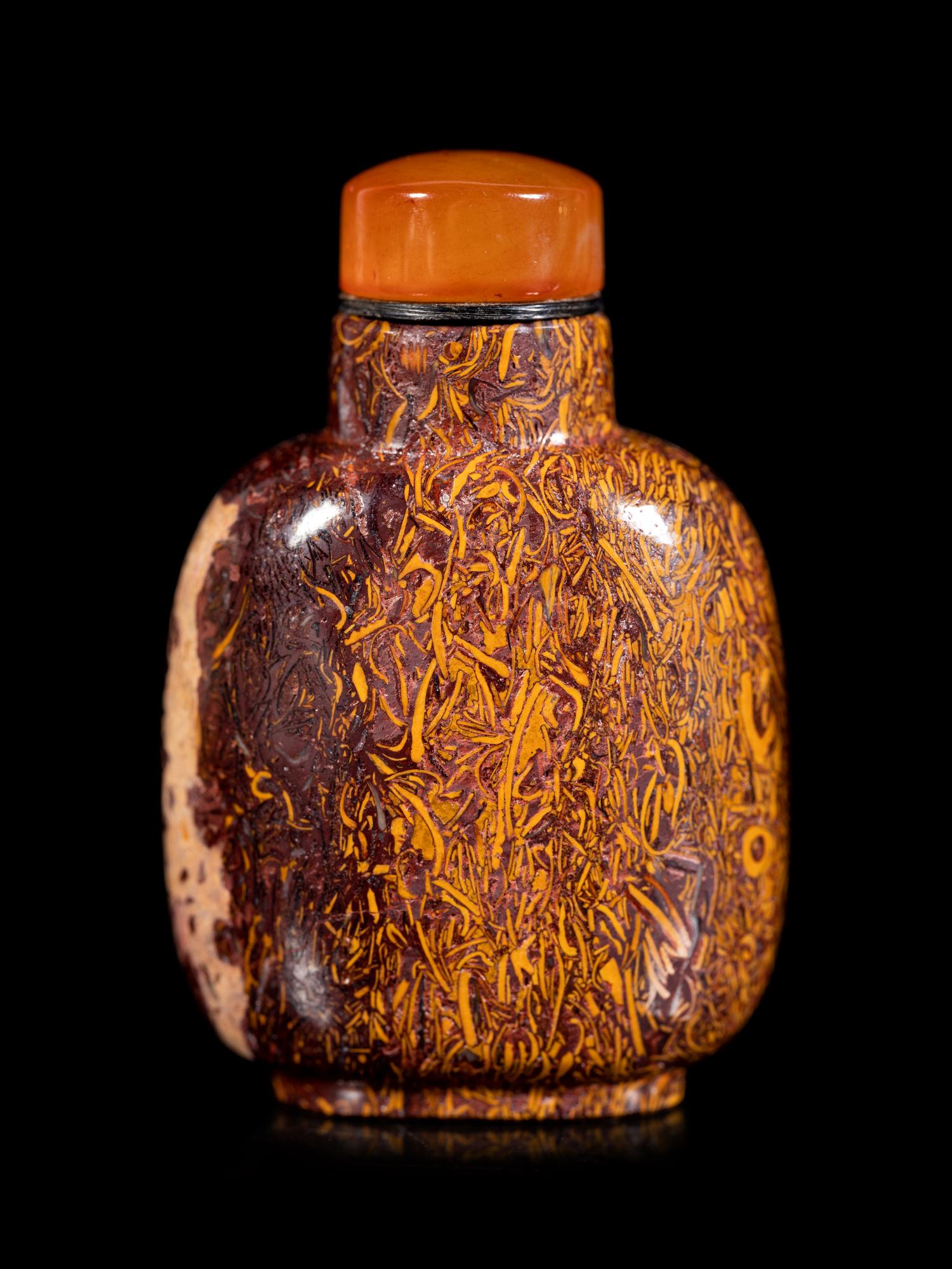 Three Chinese Hardstone Snuff Bottles
