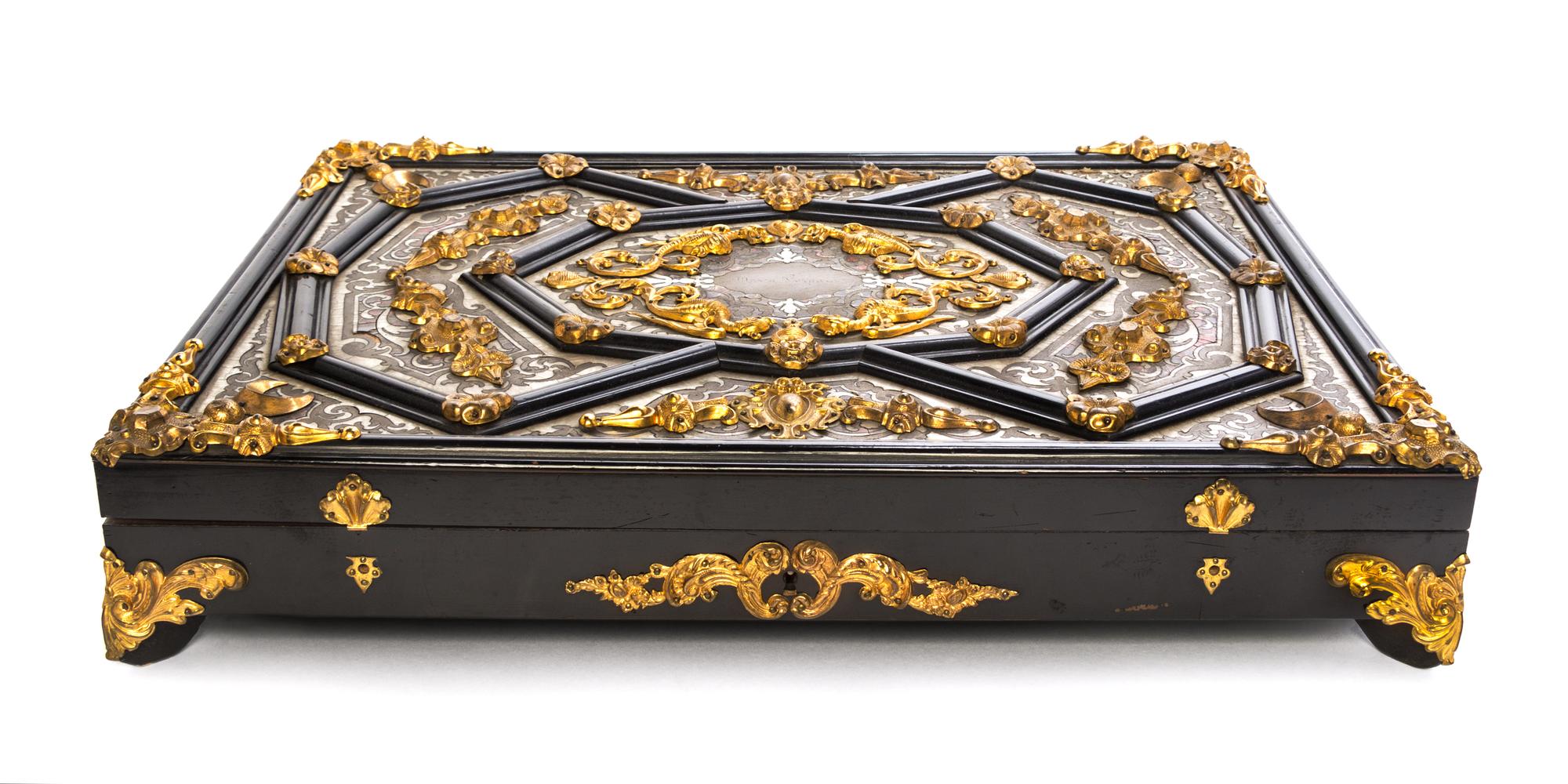 A Napoleon III Gilt-Metal Mounted Cut Brass Toroiseshell and Mother of Pearl Inlaid Ebonised Boulle Presentation Box Width 13 inches. — LATE 19TH CENTURY