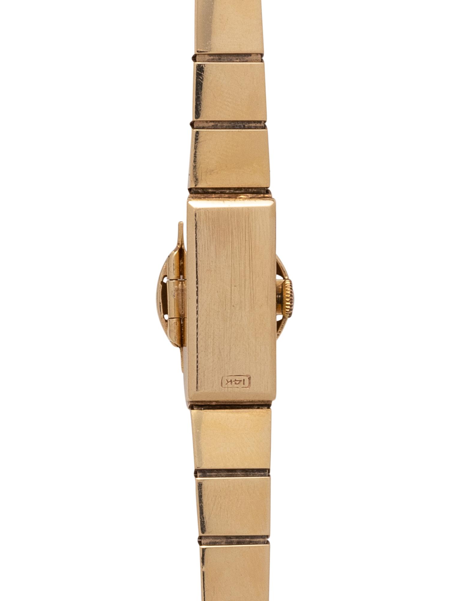 CROTON, 14K YELLOW GOLD SURPRISE WRISTWATCH