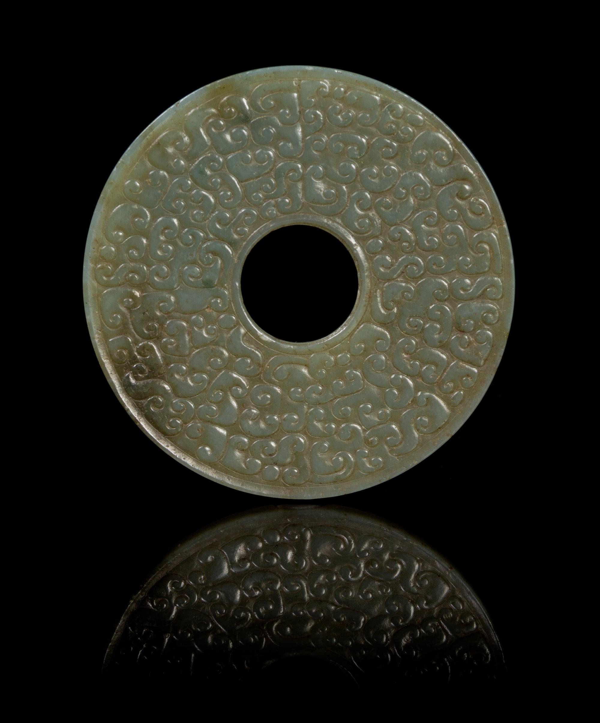 A Carved Jade Bi Diameter 2 1/4 inches.