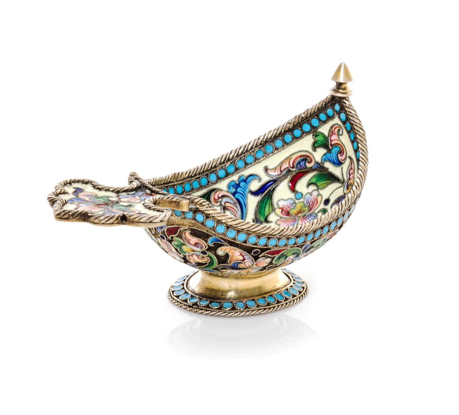 A Russian Enameled Silver-Gilt Kovsh, Maker's mark HC, having a shaped handle, the interior worked with polychrome flowers and scrolls