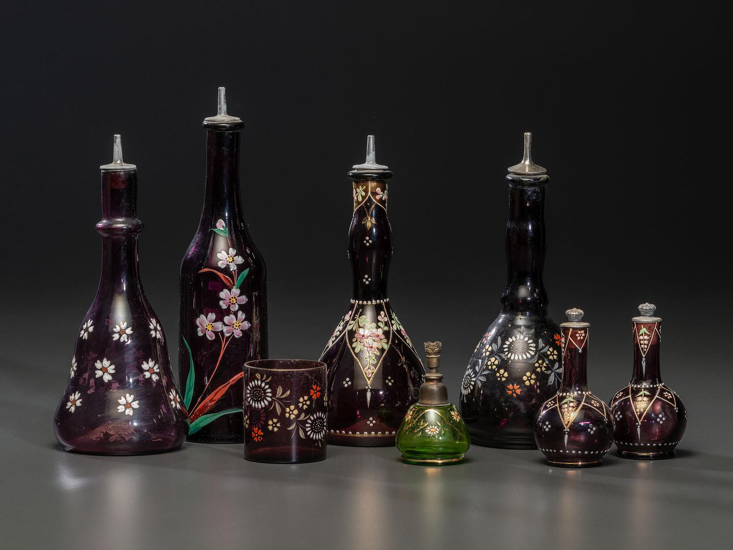 Eight Enameled Amethyst Glass Barber's Items