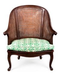A Louis XV Style Stained Beechwood Bergère Height 42 inches. — 20TH CENTURY