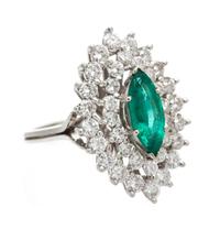A 14 Karat White Gold, Emerald and Diamond Cocktail Ring, 5.40 dwts.
