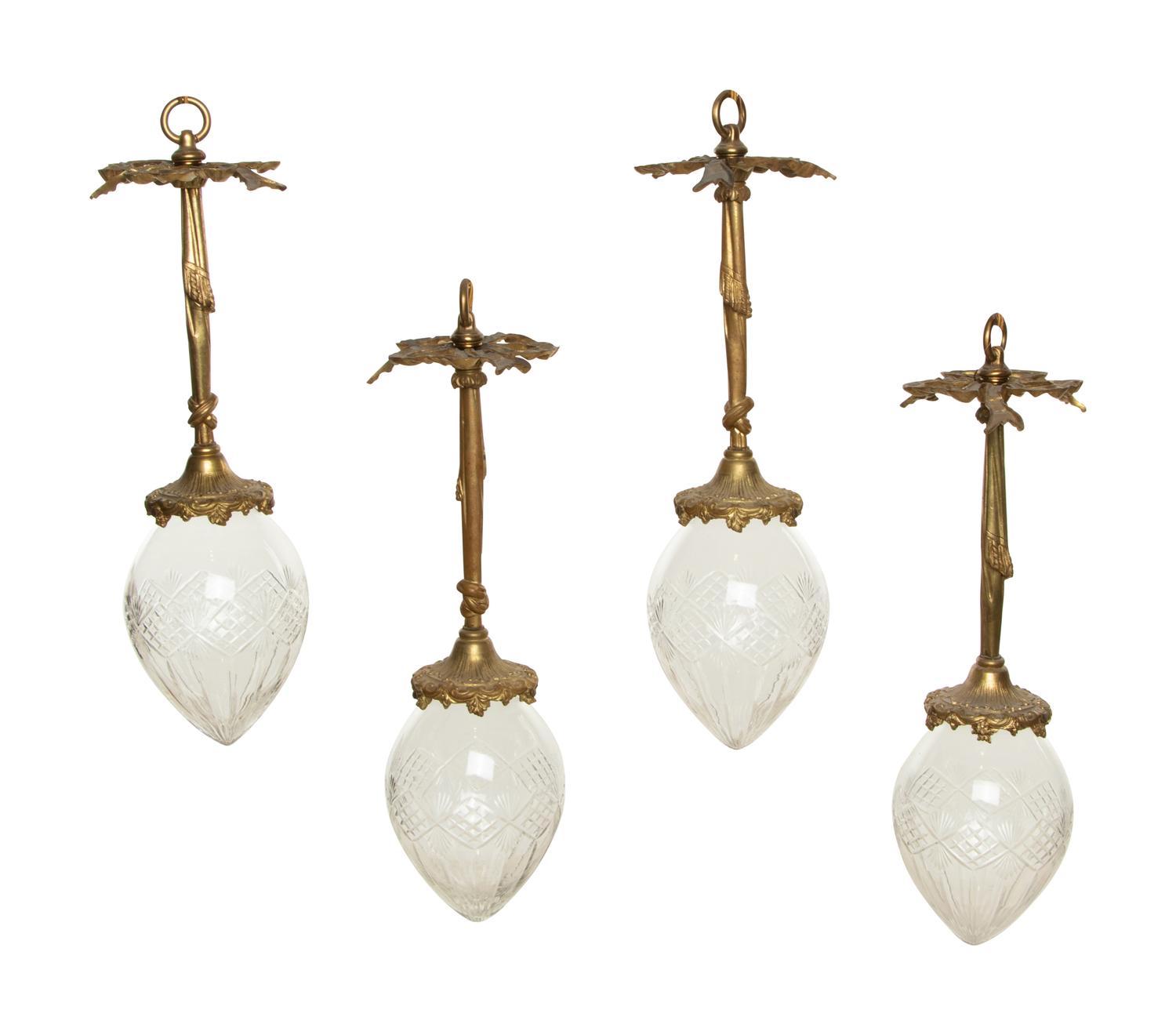 A Set of Four Gilt Bronze and Cut Glass Pendant Lights