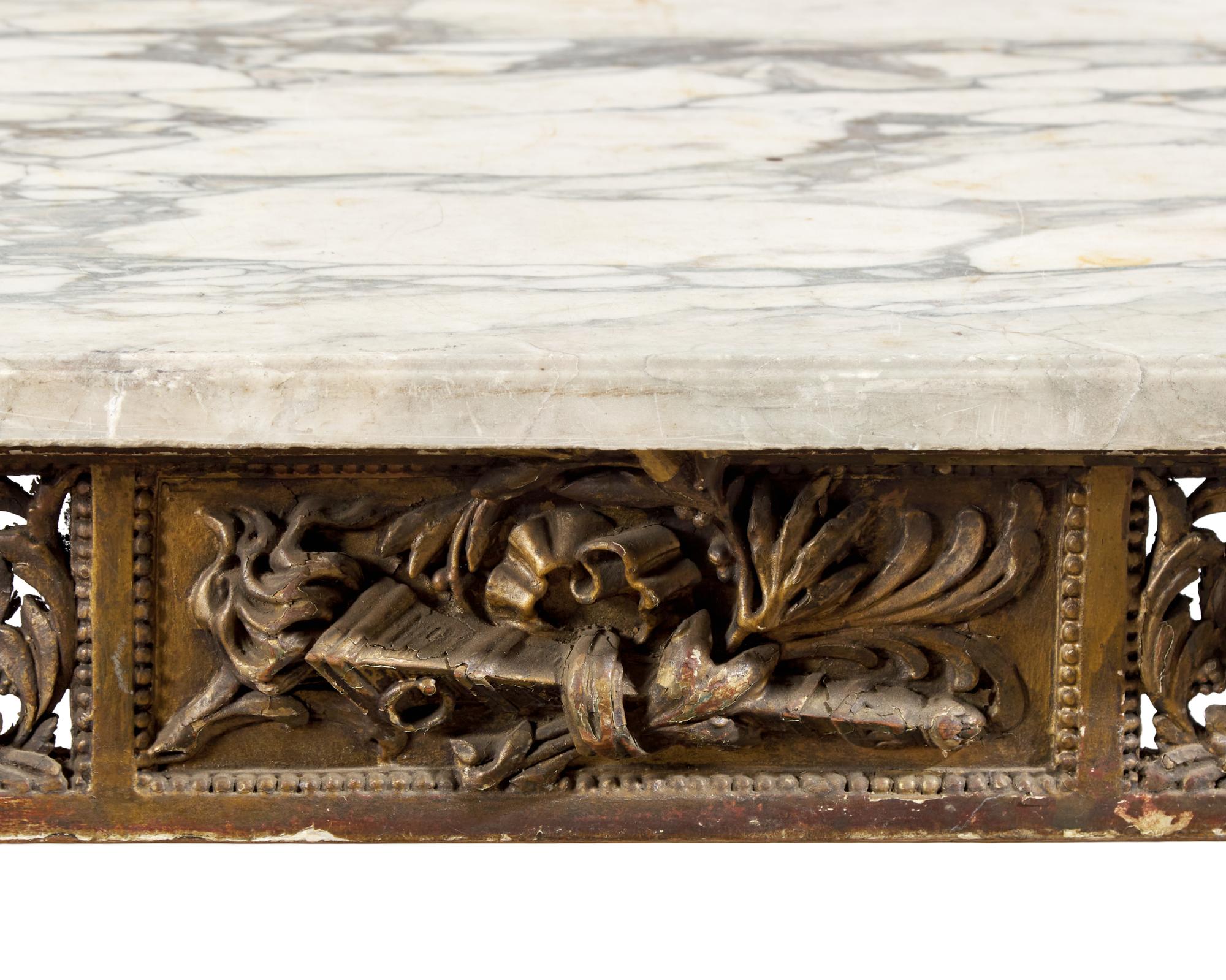 A Louis XVI Style Carved and Giltwood Center Table with Breccia Capraia Marble Top