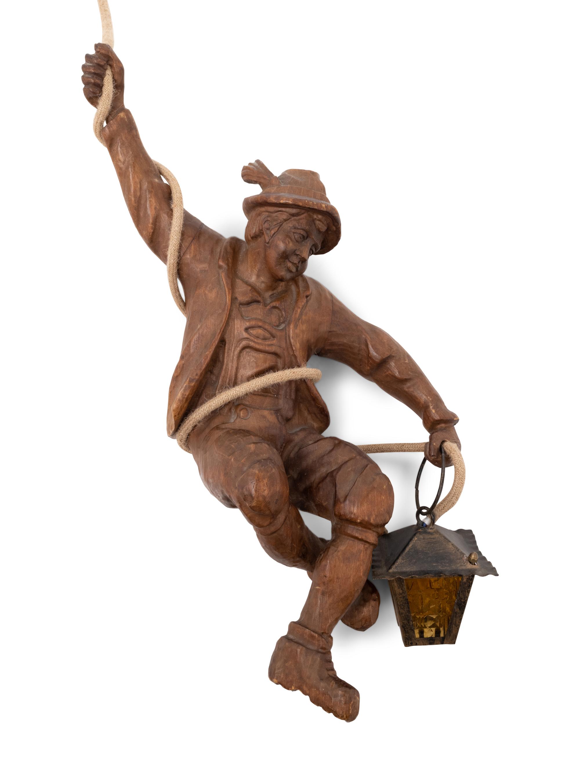 A Black Forest Carved Mountaineer Pendant Light
