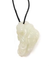 A Chinese Pale Celadon Jade Figure of a Child